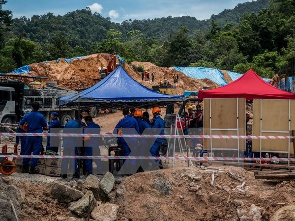 Malaysia: 11 people dead, missing in landslide hinh anh 1