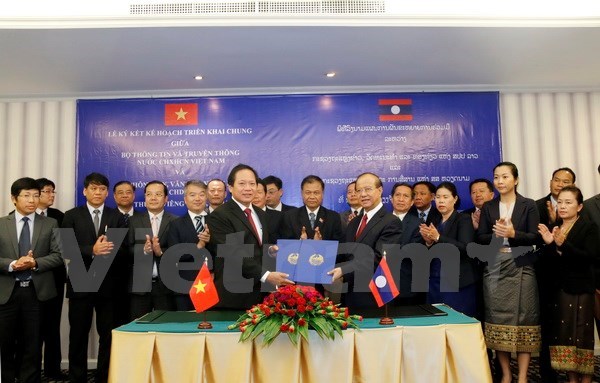 Vietnam, Laos foster information, communication partnership hinh anh 1