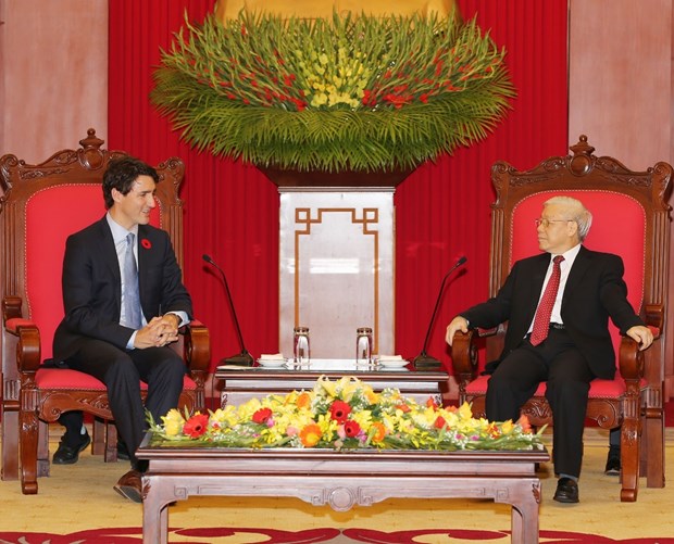 Party leader Nguyen Phu Trong welcomes Canadian PM Trudeau hinh anh 1