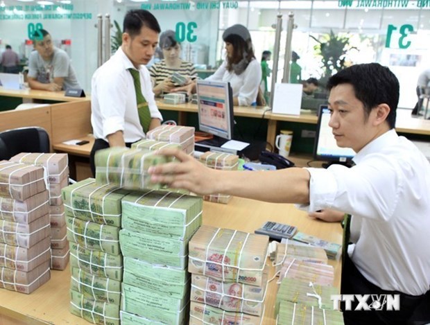Reference exchange rate down by 3 VND at week’s beginning hinh anh 1