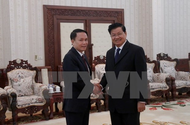 Lao Prime Minister hails Vietnam News Agency’s support hinh anh 1