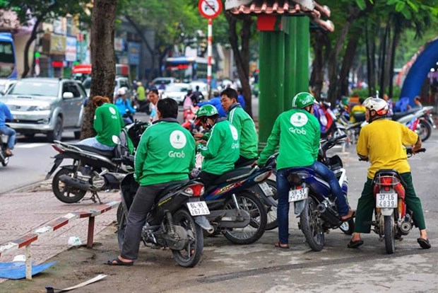 MoF probes Grab for possible tax evasion hinh anh 1