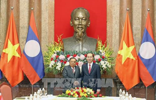 President Tran Dai Quang hails Lao leader’s visit hinh anh 1
