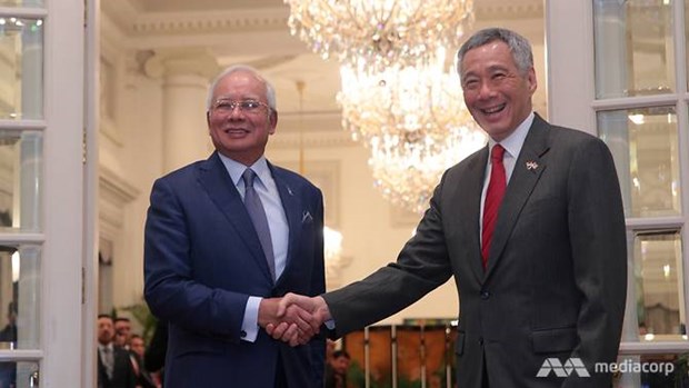 Singapore, Malaysia sign bilateral transport agreement hinh anh 1