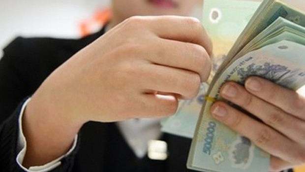 HCM City’s private firm pays highest Tet bonus of 855 million VND hinh anh 1