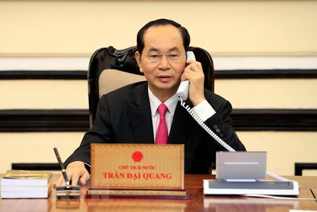 President holds phone talks with US counterpart hinh anh 1