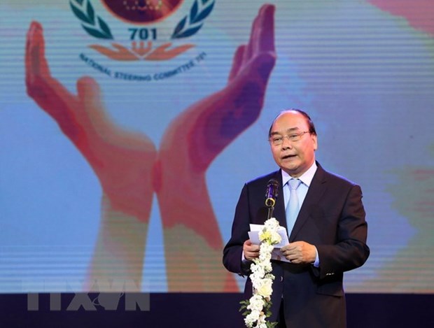 Settling bomb, mine consequences urgent: PM hinh anh 1