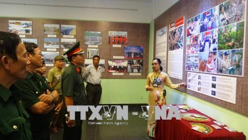 Exhibition showcases efforts to revive land polluted by UXO, chemicals hinh anh 1