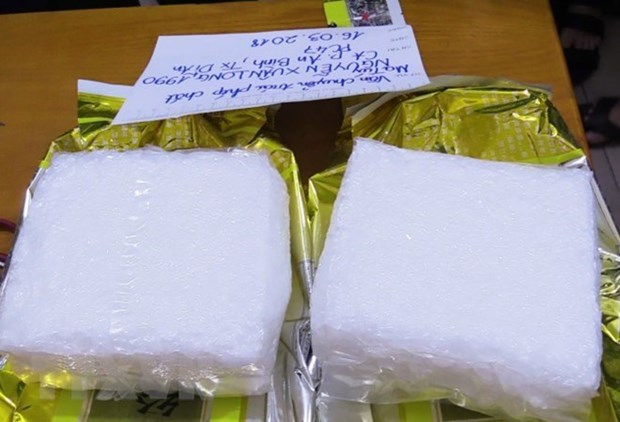 Lao Cai razes drug trafficking ring with 329 bricks of heroin hinh anh 1