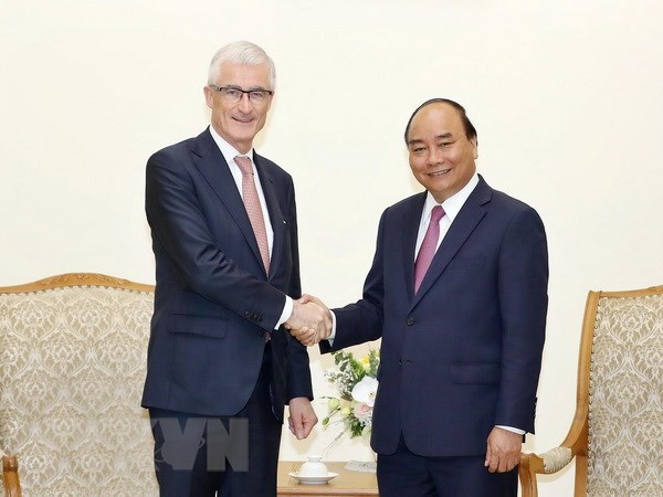 PM pledges to create optimal conditions for Belgian businesses hinh anh 1