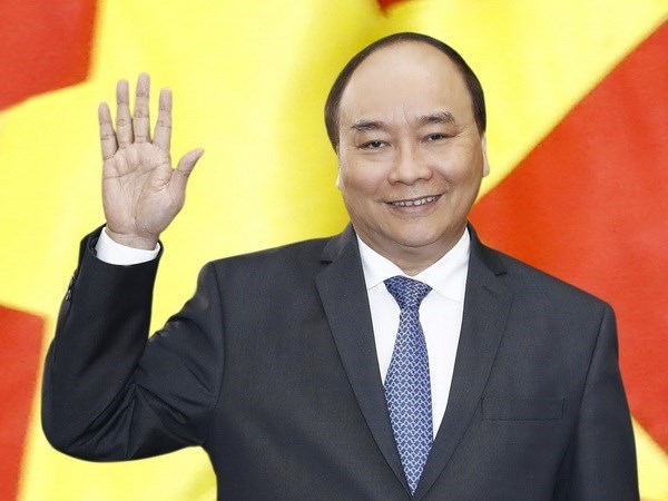 PM Nguyen Xuan Phuc leaves for expanded G7 Summit, Canada visit hinh anh 1