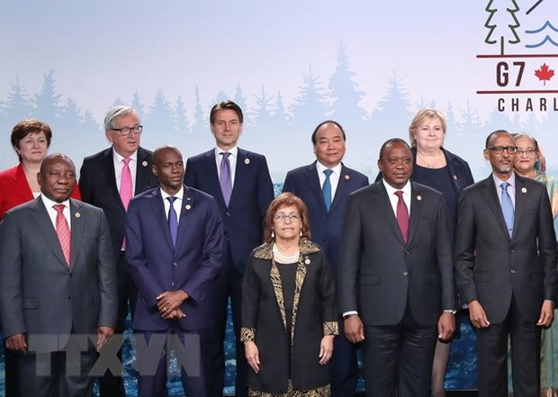 PM stresses int’l cooperation in climate change combat at G7 Outreach Summit hinh anh 1