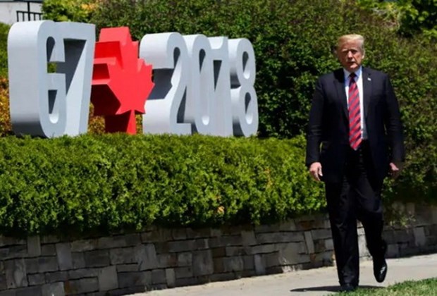 US President Donald Trump leaves G7 for Singapore hinh anh 1