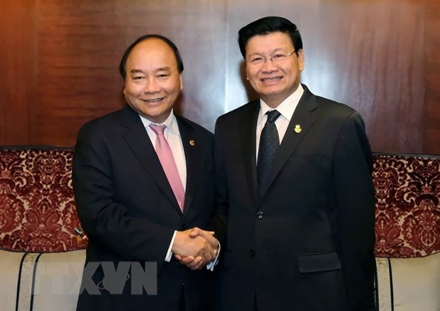 PM: Vietnam prioritises strengthening relations with Laos hinh anh 1