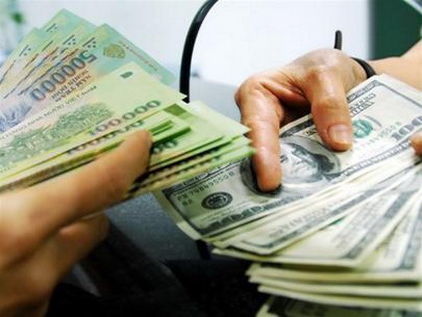 Reference exchange rate up 15 VND on June 27 hinh anh 1