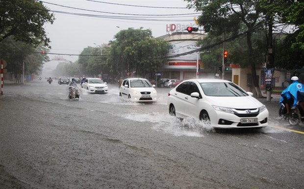 Tropical depressions add to weather woes in north, central regions hinh anh 1