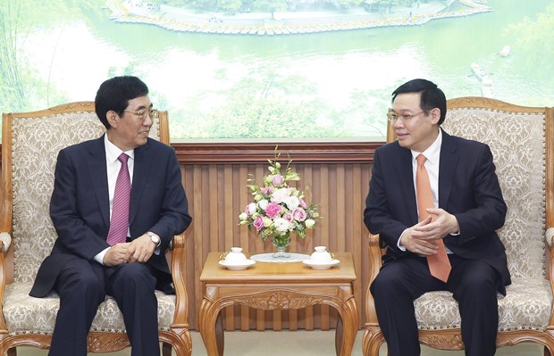 Deputy PM Vuong Dinh Hue welcomes Party chief of Chinese province hinh anh 1