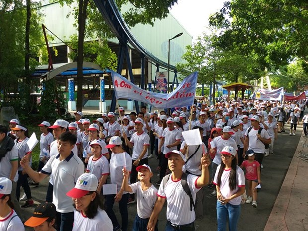 HCM City: Over 5,000 walk for AO victims, disabled hinh anh 1