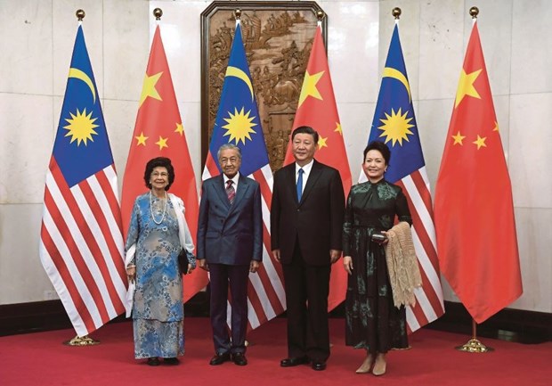 China vows to maintain friendly ties with Malaysia hinh anh 1