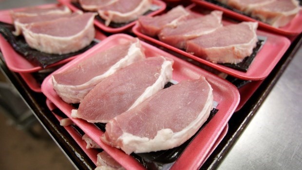 Laos suspends import of pork products from China hinh anh 1
