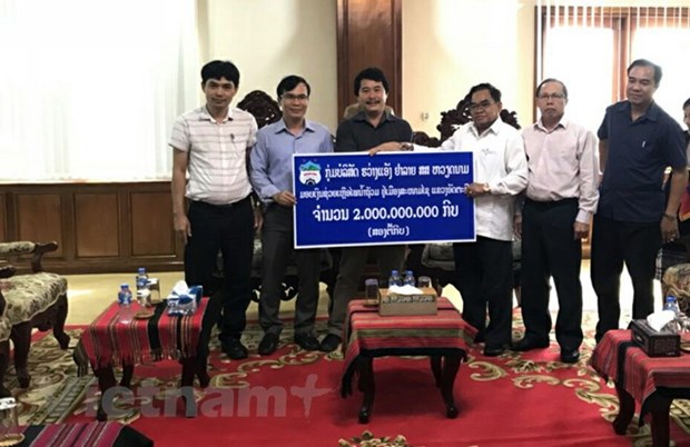 HAGL JSC continues aid to victims of Lao dam collapse hinh anh 1