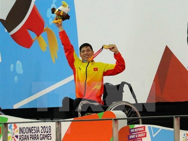 Vietnam bags seven medals on fourth day of 2018 Asian Para Games hinh anh 1