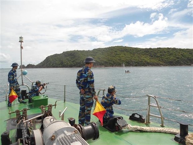 Coast guard forces of Vietnam, China hold second working conference hinh anh 1