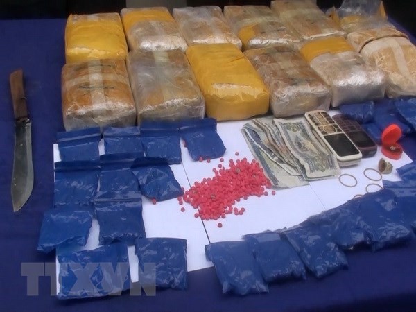 Son La: 12 bricks of heroin, 36,000 meth pills seized hinh anh 1