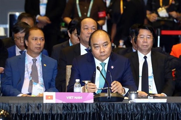 Prime Minister attends 21st ASEAN+3 Summit hinh anh 1