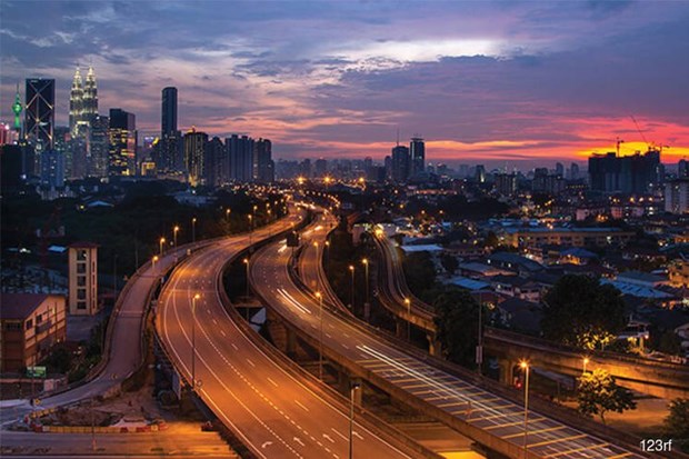 Fitch lowers Malaysian growth forecast to 4.6 percent hinh anh 1