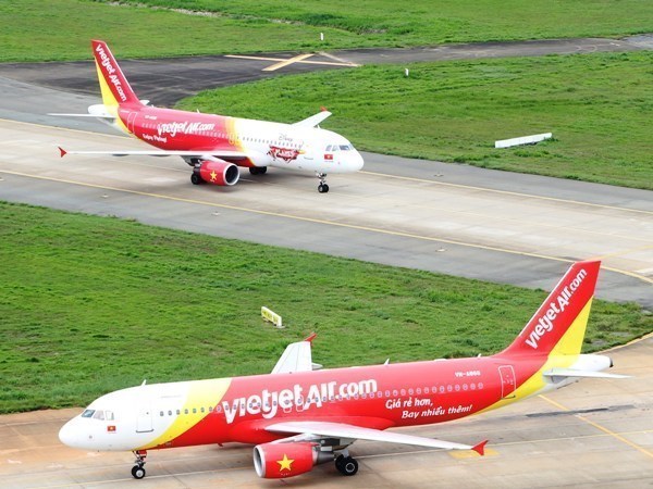 Many Vietjet flights affected by storm Usagi hinh anh 1