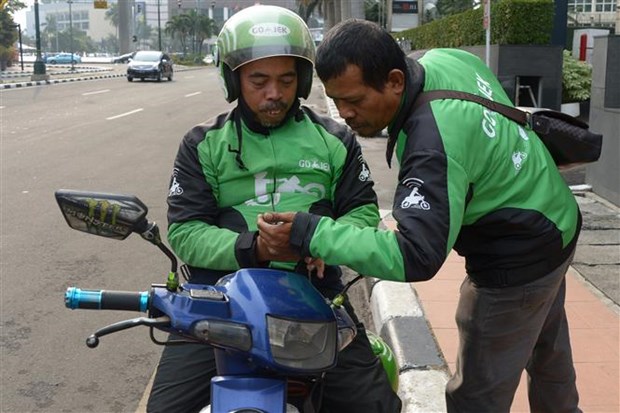Indonesia’s ride-hailing service provider Go-Jek enters Singapore hinh anh 1