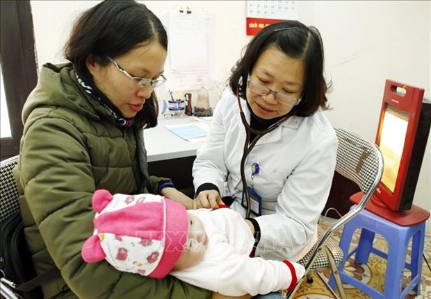Vietnam targets vaccination rate of 95 percent for under-1-year-old children hinh anh 1