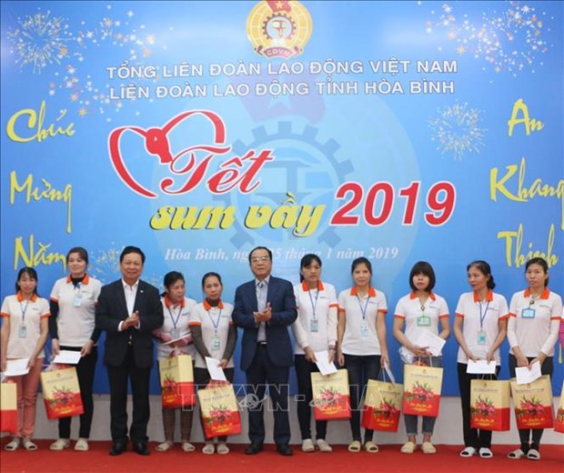 State, organisations join hands to ensure a happy Tet for all hinh anh 1