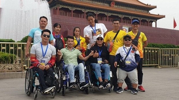 Vietnam shines at 2019 World Para Athletics Grand Prix in China hinh anh 1