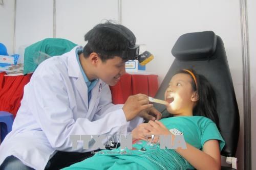 HCM City provides free health checks for children hinh anh 1