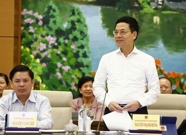 MIC leader answers deputies’ questions at NASC’s 36th session hinh anh 1