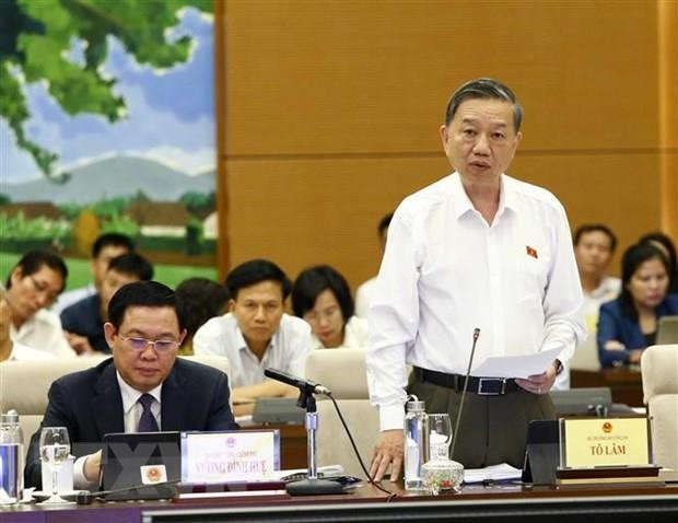 Public security minister fields questions relating ‘black credit’ issue hinh anh 1