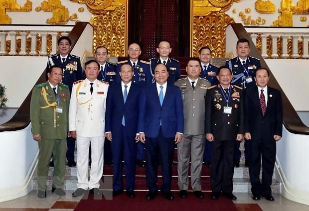 PM receives heads of delegations to ASEANAPOL 39 hinh anh 1