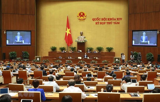 Minister answers NA deputies’ questions on press management hinh anh 1