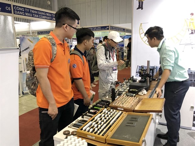 Int’l machinery, supporting industry fairs open in HCM City hinh anh 1