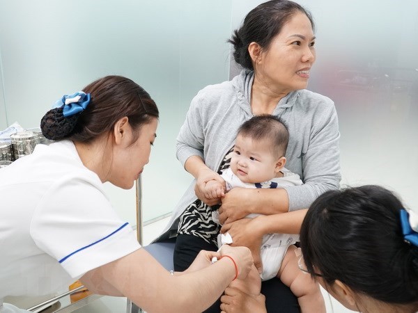 Vaccination coverage in HCM City reaches 95 percent hinh anh 1