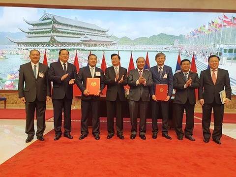 EVN, Laos’ Phongsubthavy Group sign power purchase agreements hinh anh 1