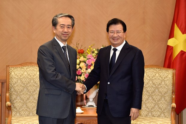 Deputy PM Trinh Dinh Dung hosts Chinese Ambassador hinh anh 1