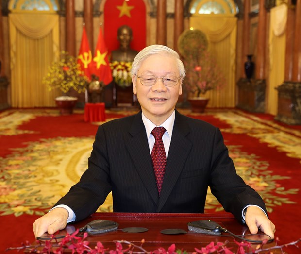 Top leader offers Tet greetings hinh anh 1