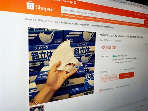 Online sellers fined for hiking prices of face masks, hand sanitiser hinh anh 1
