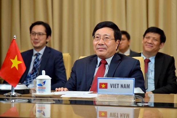 Vietnam proposes measures for COVID-19 fight at multilateral meeting hinh anh 1
