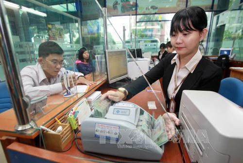 Reference exchange rate up 5 VND on April 17 hinh anh 1