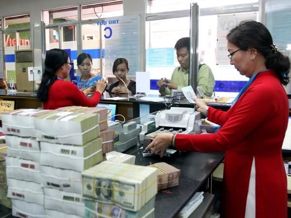 Reference exchange rate down 3 VND at week’s beginning hinh anh 1