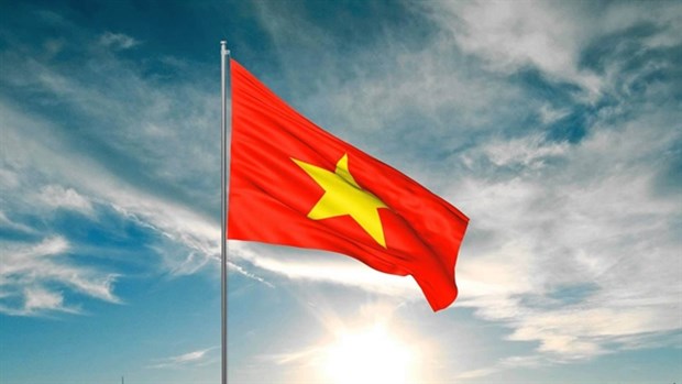 Newspapers print flag to mark national reunification day hinh anh 1